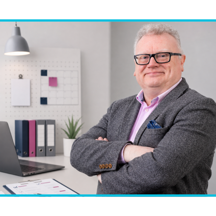 Picture Of Ian Beardmore Standing In An Office